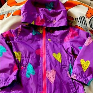 New rain jacket w/tag. Size 4T